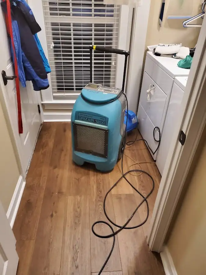 Commercial dehumidifier deployed for Flood Damage Cleanup in Firestone